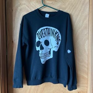 Black Halloween goth sweatshirt with a white skull. Size M/L.